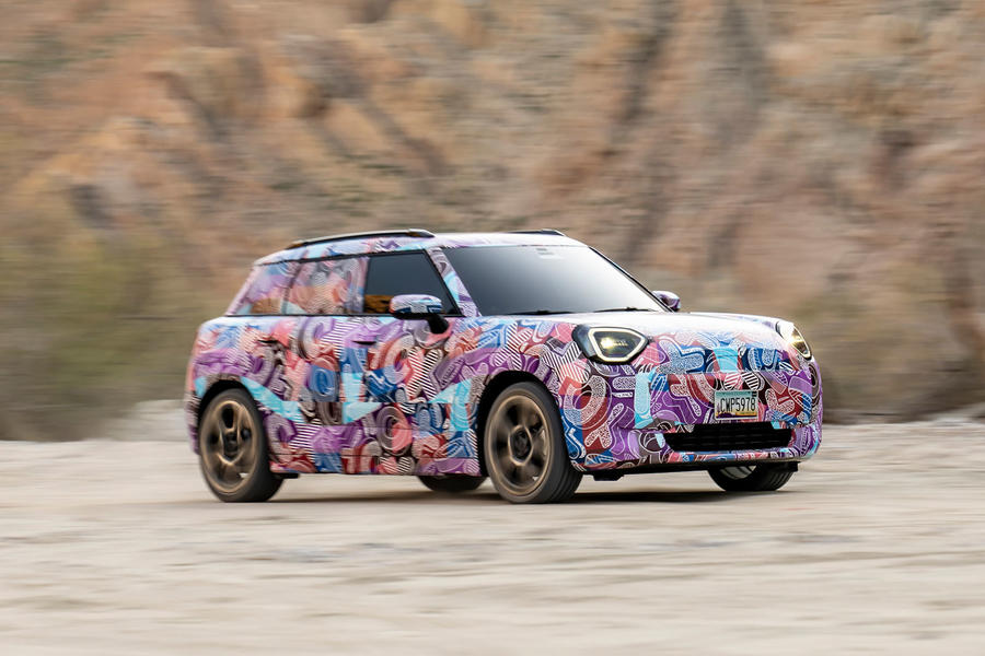 mini aceman camouflaged front quarter off road