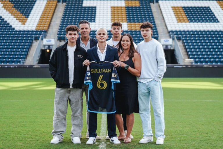 Cavan Sullivan middle with jersey poses with his family after signing his first team contract with the Philadelphia Union